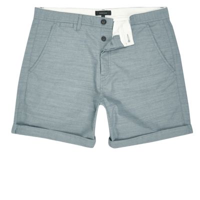 Green textured slim fit shorts